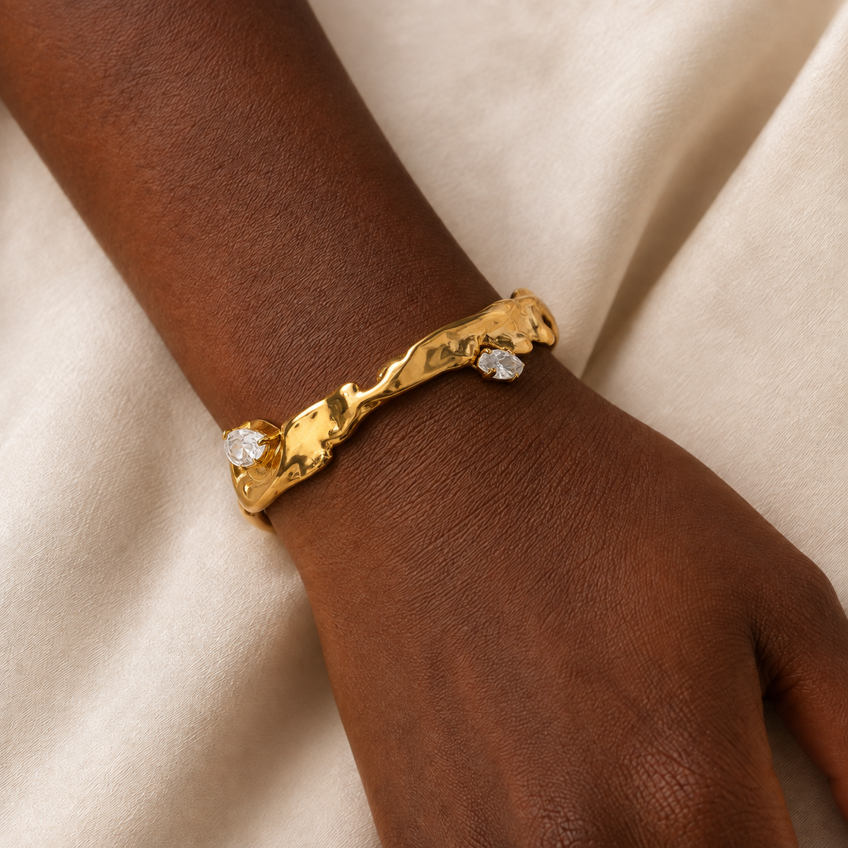 Ravelle Molten Zircon Cuff Bracelet worn by a model in a close-up