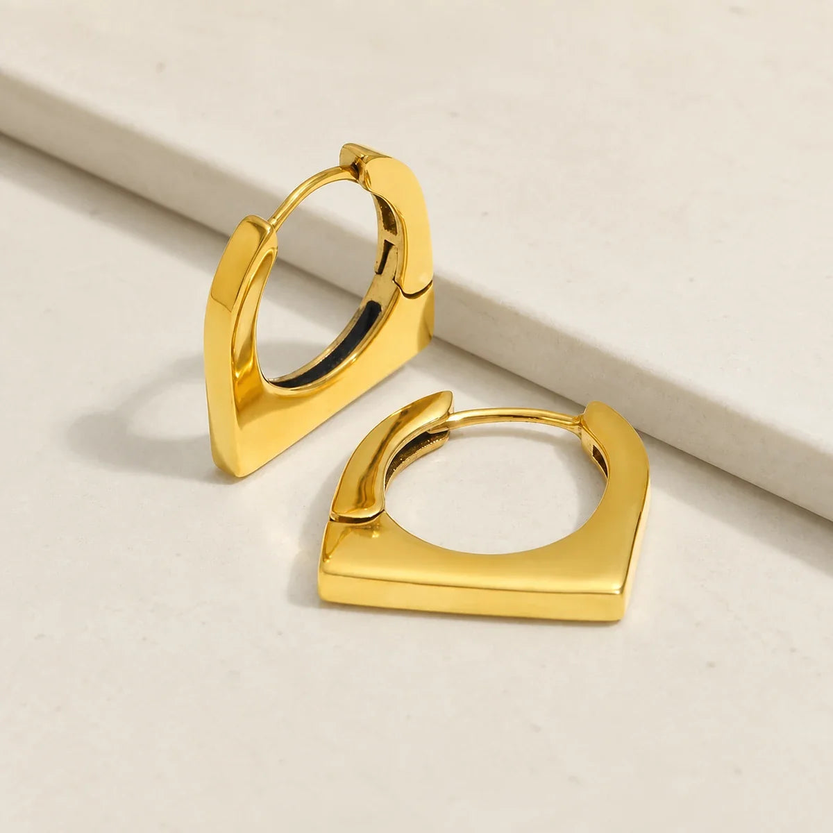 Angle Earrings editorial — TAIA Jewellery