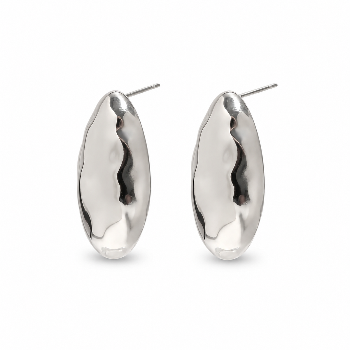 Luma Earrings in polished silver on a pure white background — TAIA Jewellery