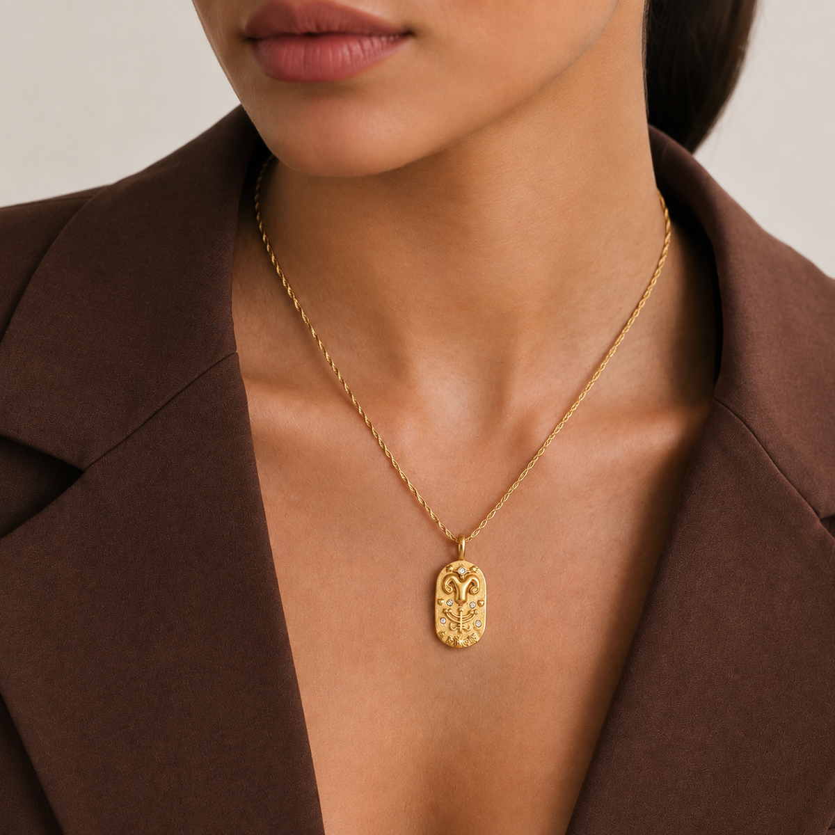 Astria Zodiac Necklace worn by a model in a close-up