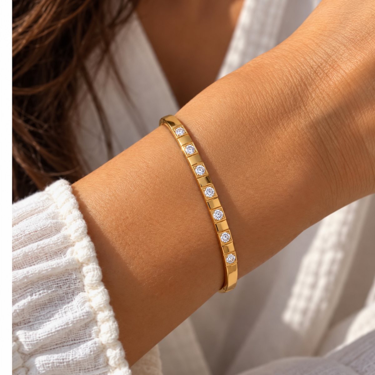 Cyra Baguette Bangle worn in a natural wrist close-up — TAIA Jewellery