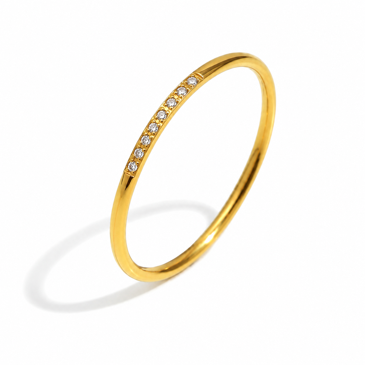 Eloise Zircon Stack Ring – slim gold band with a row of eight clear stones