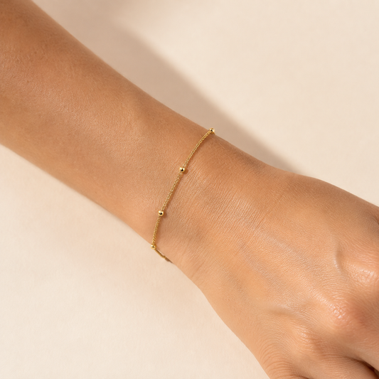 Close-up of the Inez Satellite Bracelet worn on the wrist