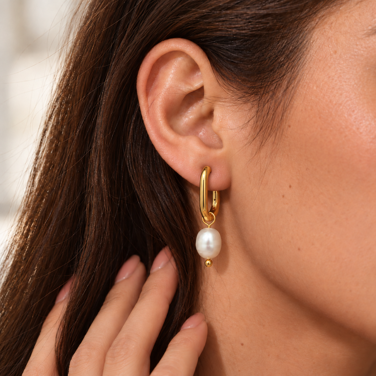 Isa Pearl Drop Hoop Earrings worn by a TAIA model — TAIA Jewellery