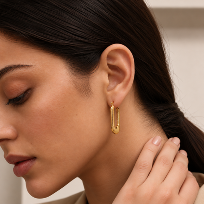 Léa Ribbed Rectangle Hoops worn by a TAIA model with nude nails — TAIA Jewellery
