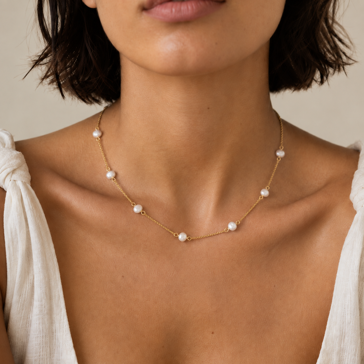 Maribel Baroque Pearl Necklace worn by a model in a close-up