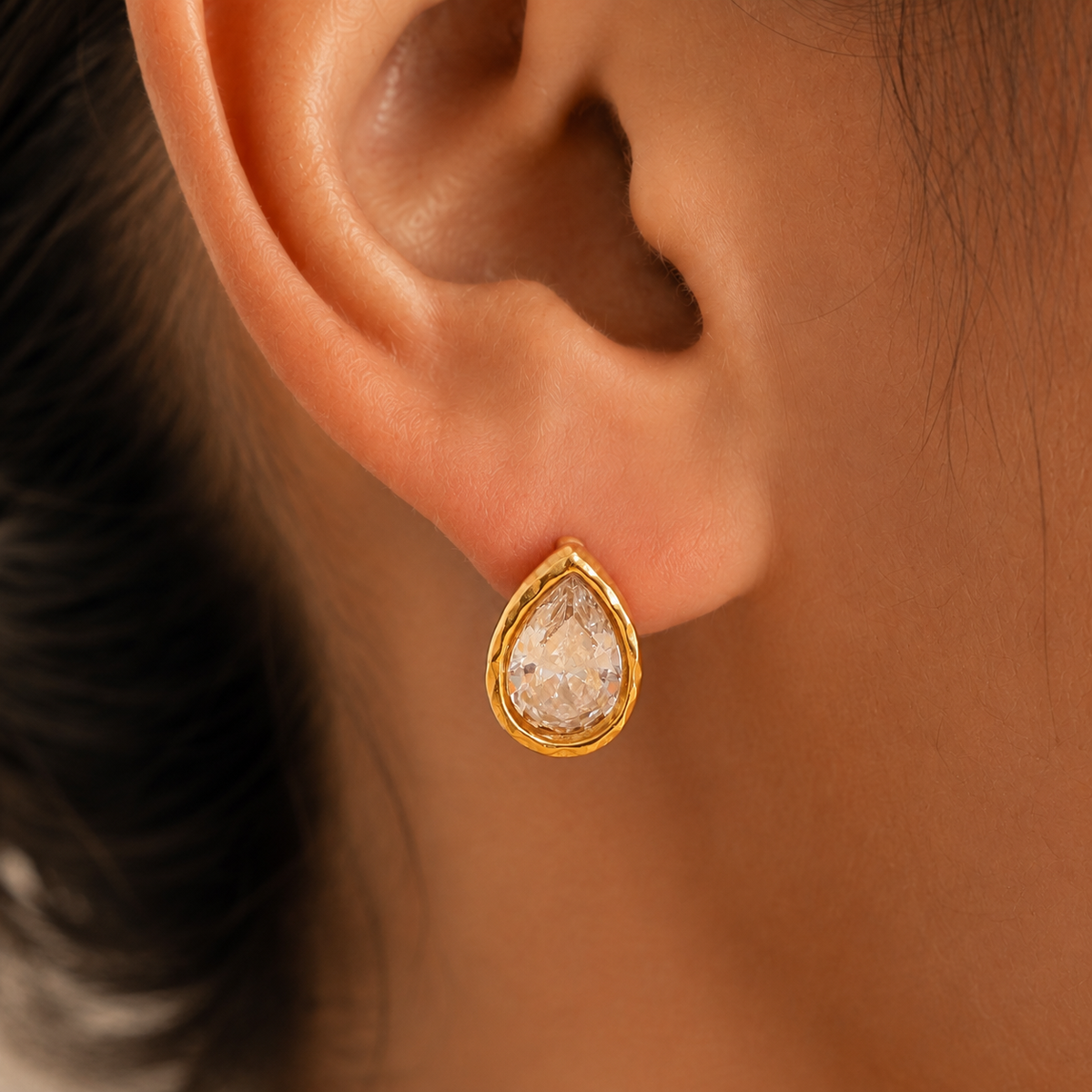 Nerissa Teardrop Zircon Earrings worn by a model in a close-up
