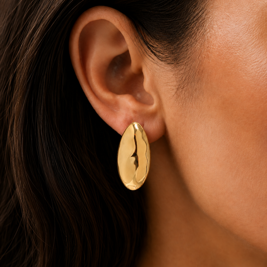 Luma Earrings worn by a model in a close-up
