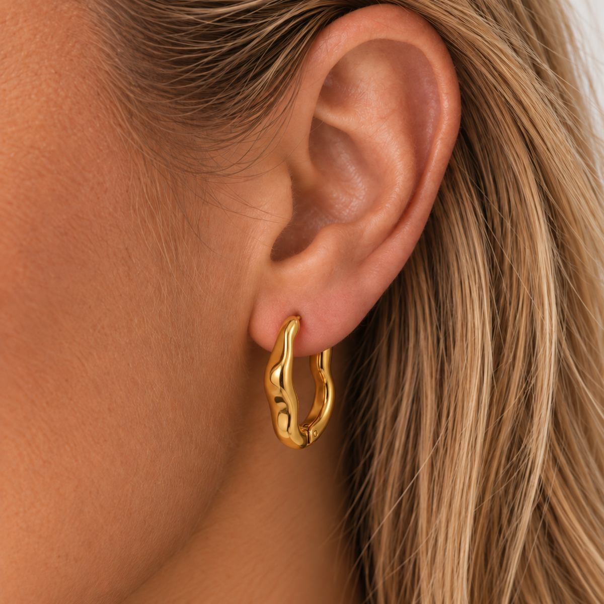 Ondine Wavy Hoop Earrings worn by a blonde TAIA model — corrected supplier scale