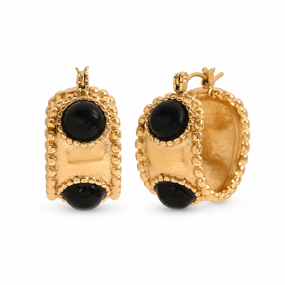 Oriane Hoop Earrings – wide gold hoops with black stones and beaded edges on white