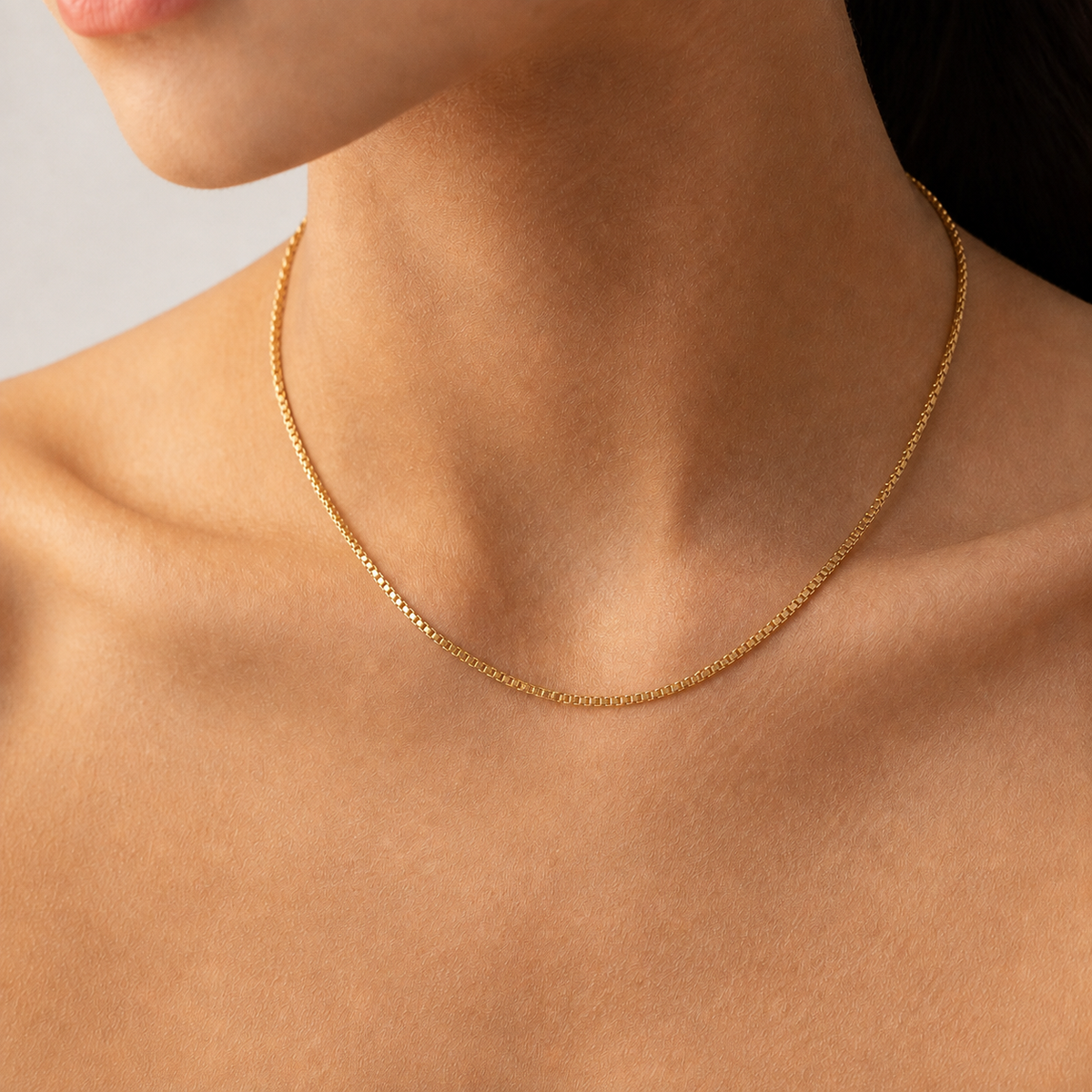TAIA Renna Box Chain Necklace in gold worn at the collarbone