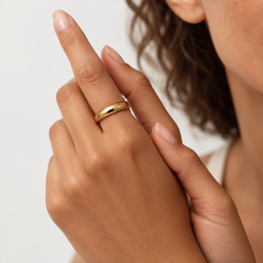 Alba Ring in gold worn by a model — TAIA Jewellery