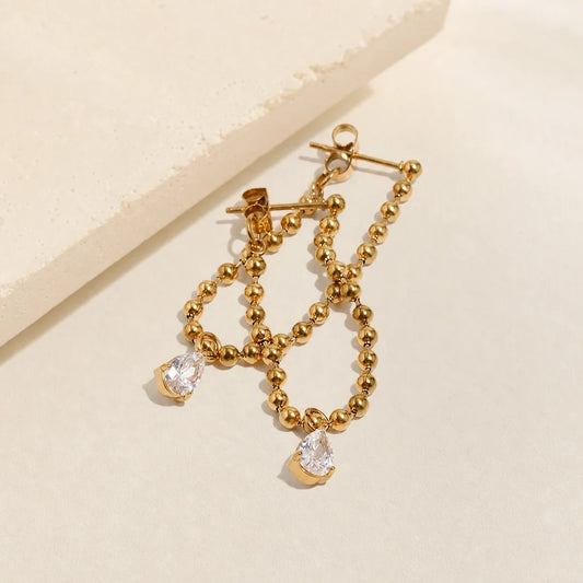 Chainfall Earrings editorial — TAIA Jewellery