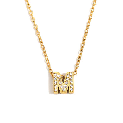 Éliane Pavé Initial Necklace — Letter M in gold