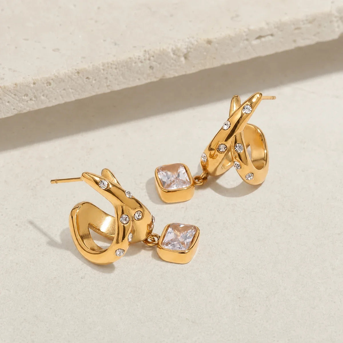 Facet Earrings editorial — TAIA Jewellery