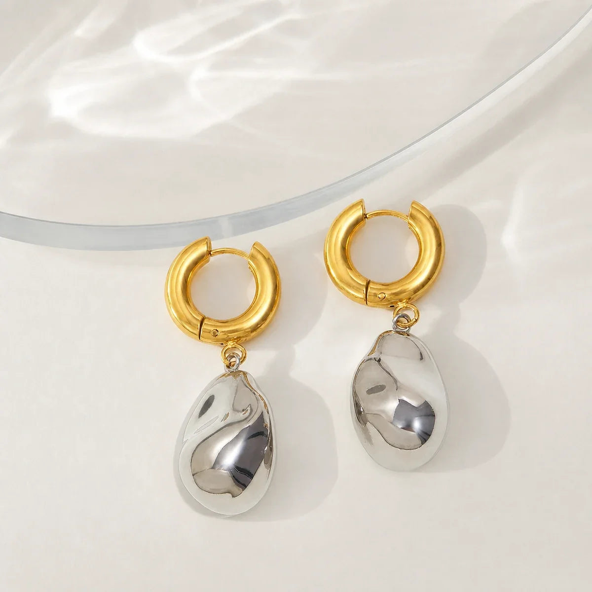 Forma Earrings editorial — TAIA Jewellery