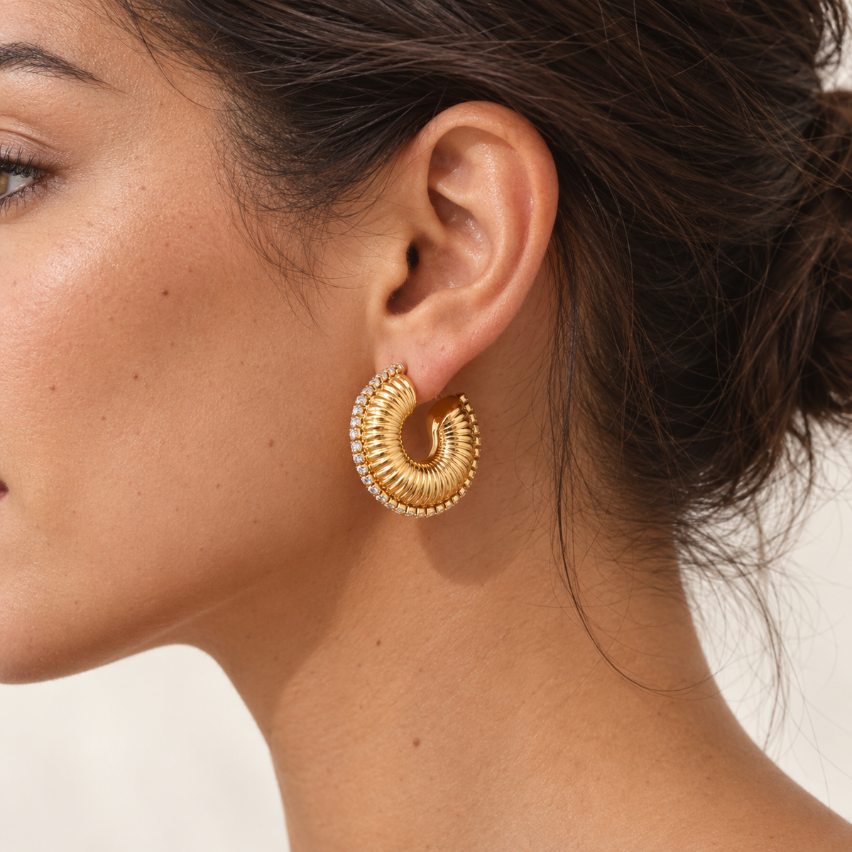 Gisele Ribbed Pavé Hoops in gold worn by a model — TAIA Jewellery