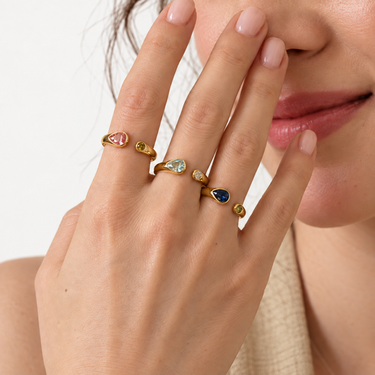 Three Mirelle Duo Zircon Rings worn across three fingers on a light background — TAIA Jewellery