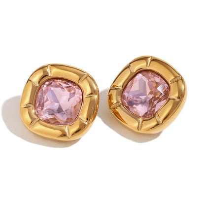 Paloma Cushion Stone Earrings – pink cushion-cut stones in sculptural gold settings on white