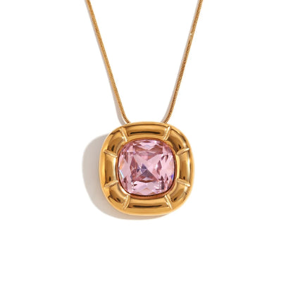 Paloma Cushion Stone Necklace – pink cushion-cut pendant in a sculptural gold setting on white
