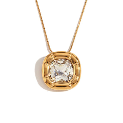 Paloma Cushion Stone Necklace – clear cushion-cut pendant in a sculptural gold setting on white