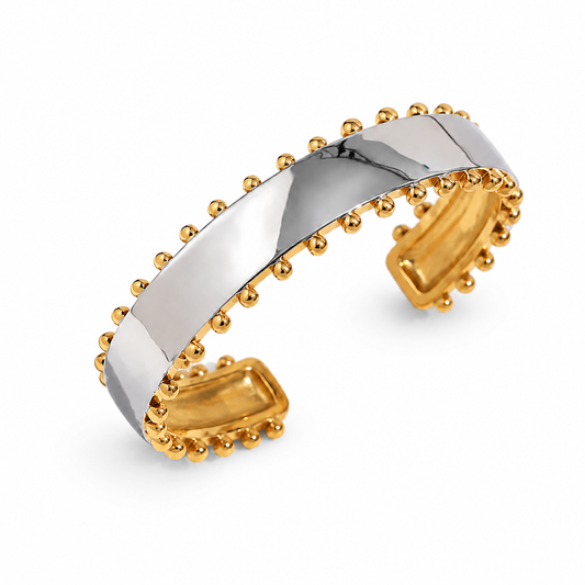 Riva Bracelet in mixed silver and gold on a pure white background