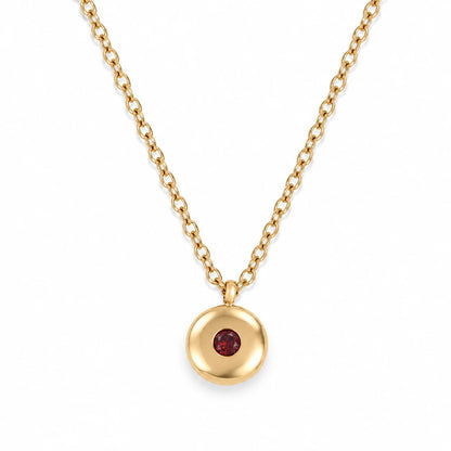 Ruth Birthstone Necklace – January – polished gold birthstone pendant on white