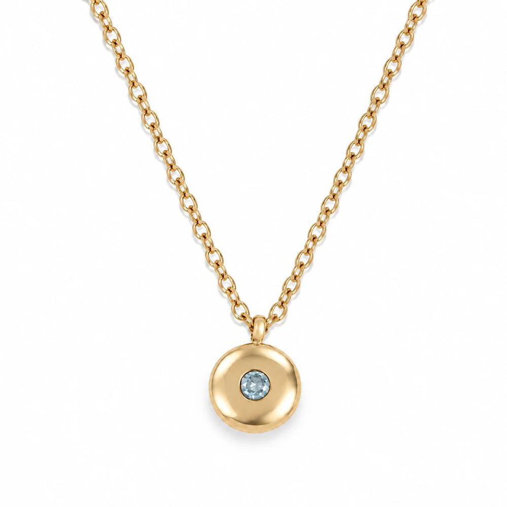 Ruth Birthstone Necklace – March – polished gold birthstone pendant on white