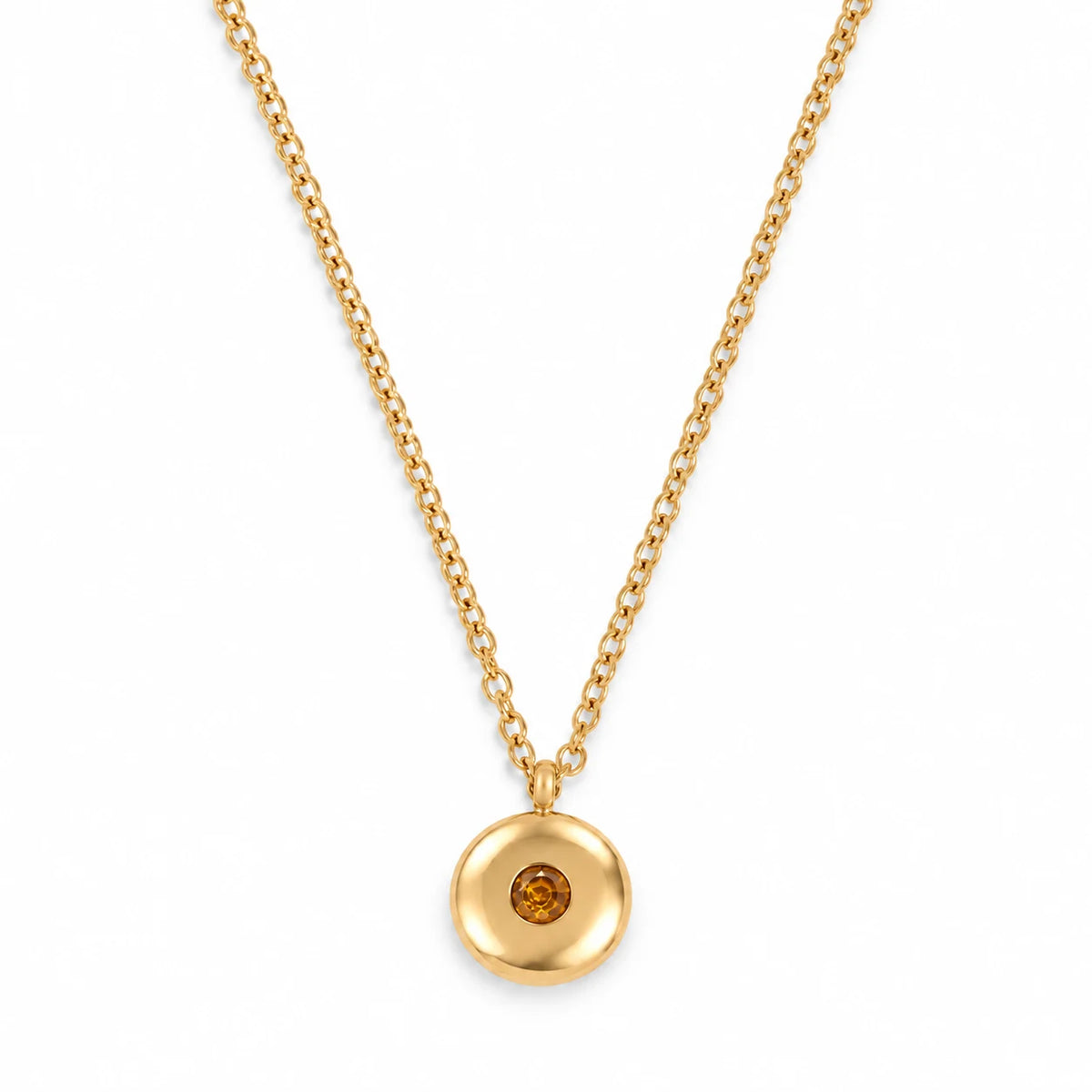 Ruth Birthstone Necklace – November – polished gold birthstone pendant on white