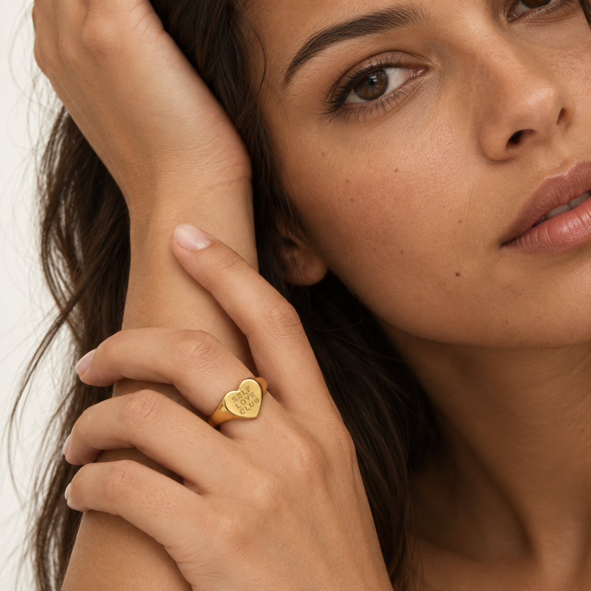 Self Love Ring worn by a model in natural light — TAIA Jewellery