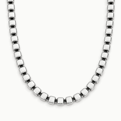 Skye Necklace – polished silver square-link chain shown close-up on white
